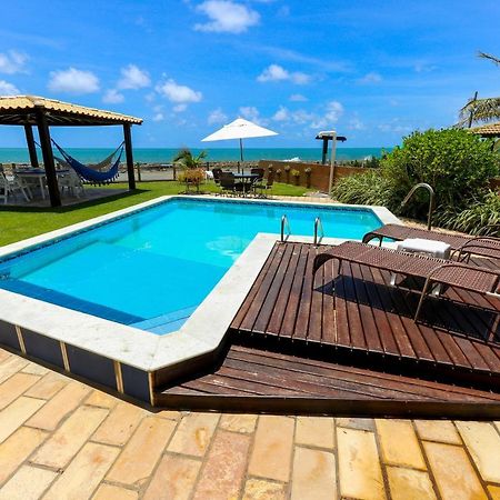 Casa A Beira Mar Com 4 Suites E Muito Conforto Порту-де-Галиньяш Экстерьер фото